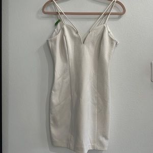 White bodycon dress by guess size 6